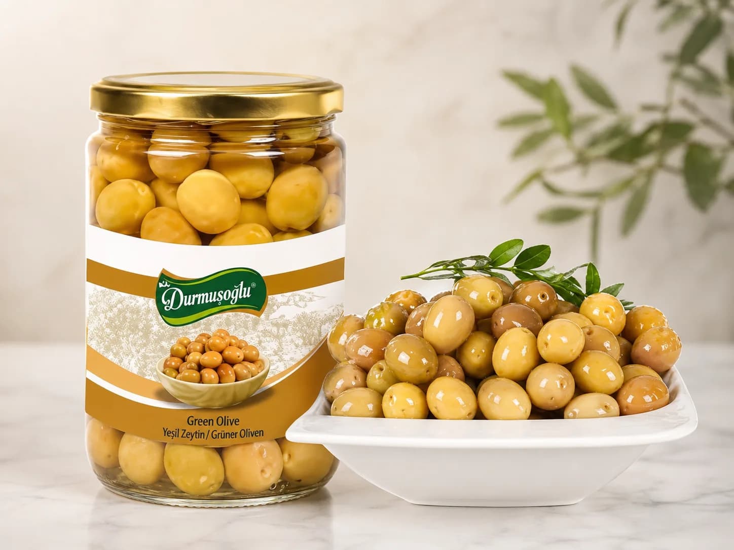 Edremit type scratched green olive in a 720 cc glass jar